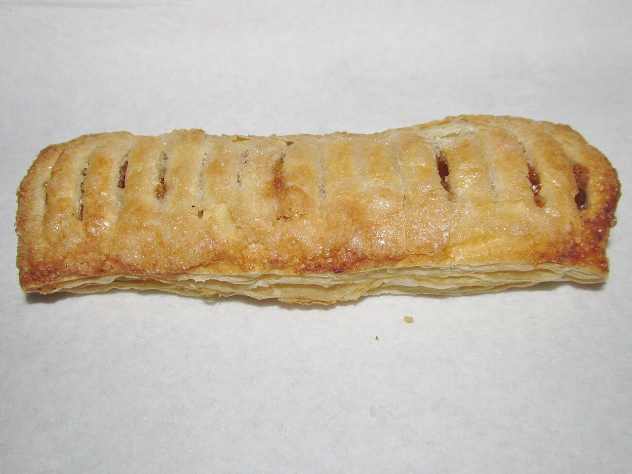 A golden baked apple strudel.