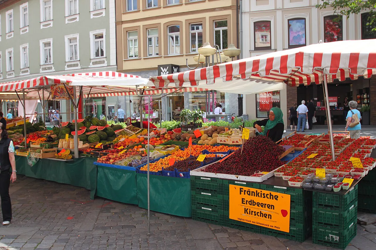 Fruit and Franconian strawberries at the weekly market on the Grüner Markt, Bamberg.