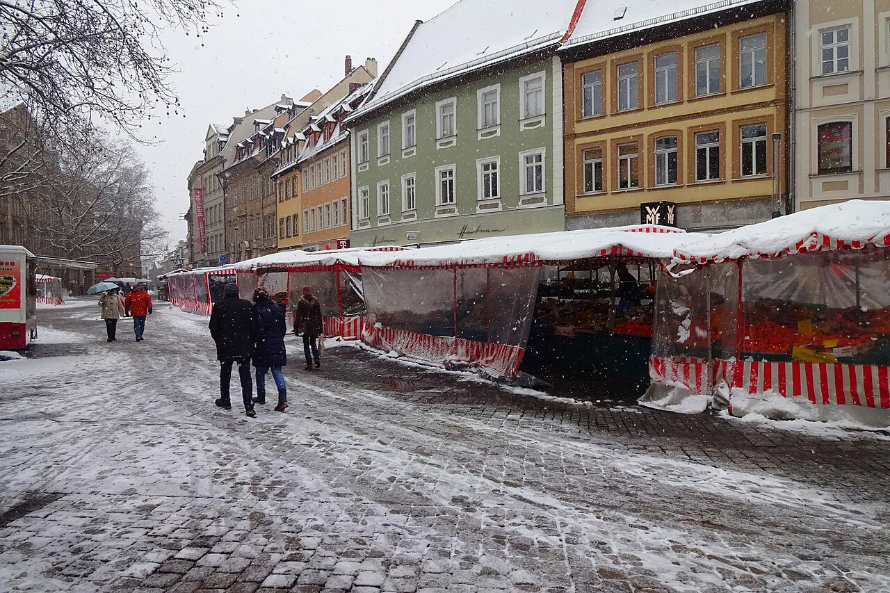 Covered stalls at the winter weekly market on the Grüner Markt, Bamberg.