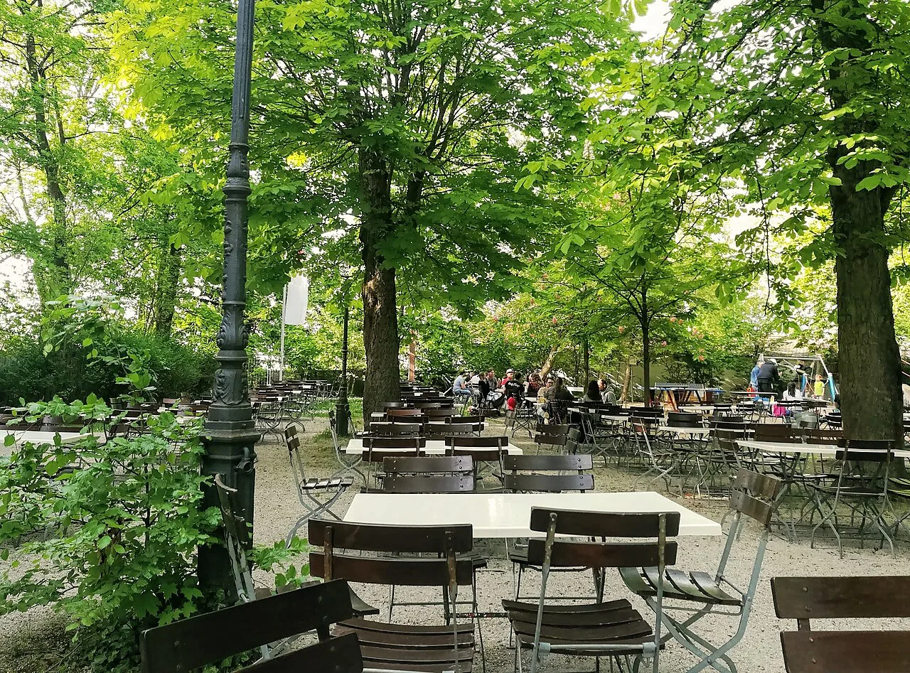 Tables under the trees at the Wilde Rose Keller beer garden, Bamberg.
