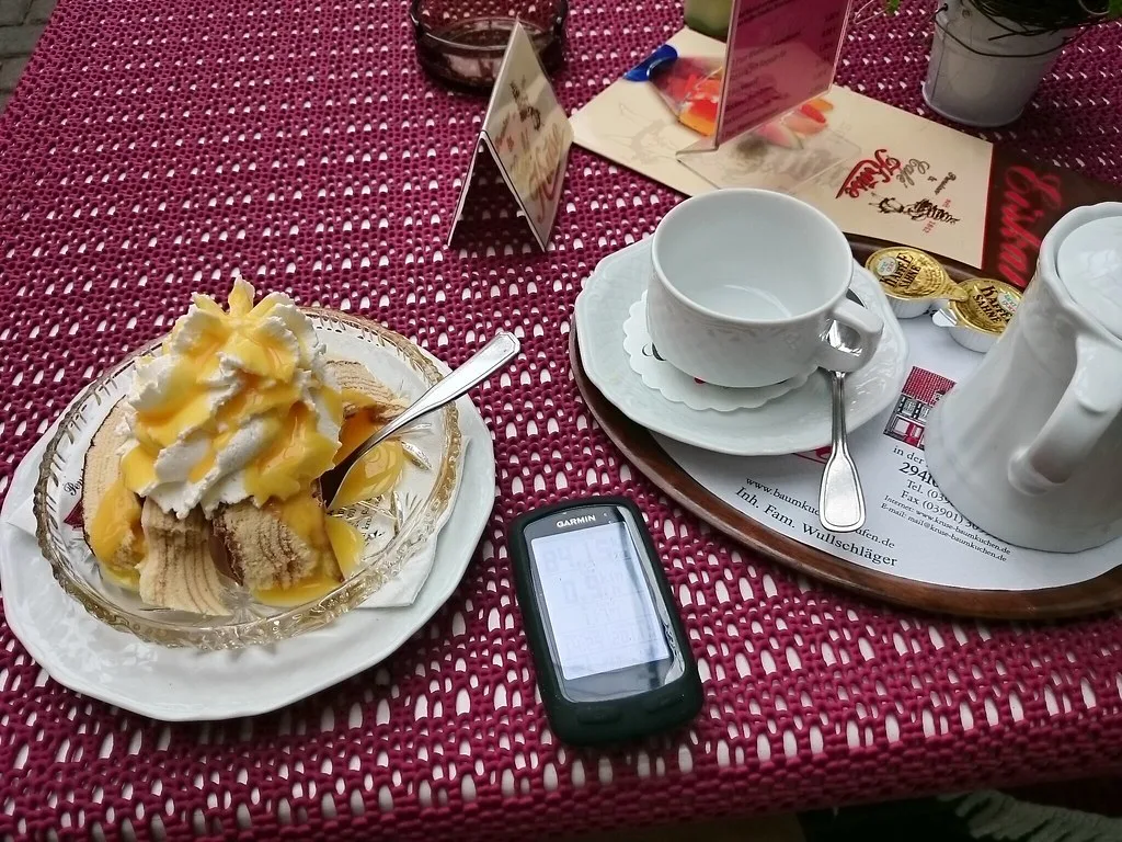 Baumkuchen with whipped cream at Café Kruse in Salzwedel.