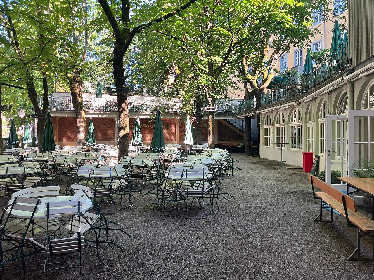 Tables under the trees in the Feierling beer garden, Freiburg im Breisgau.
