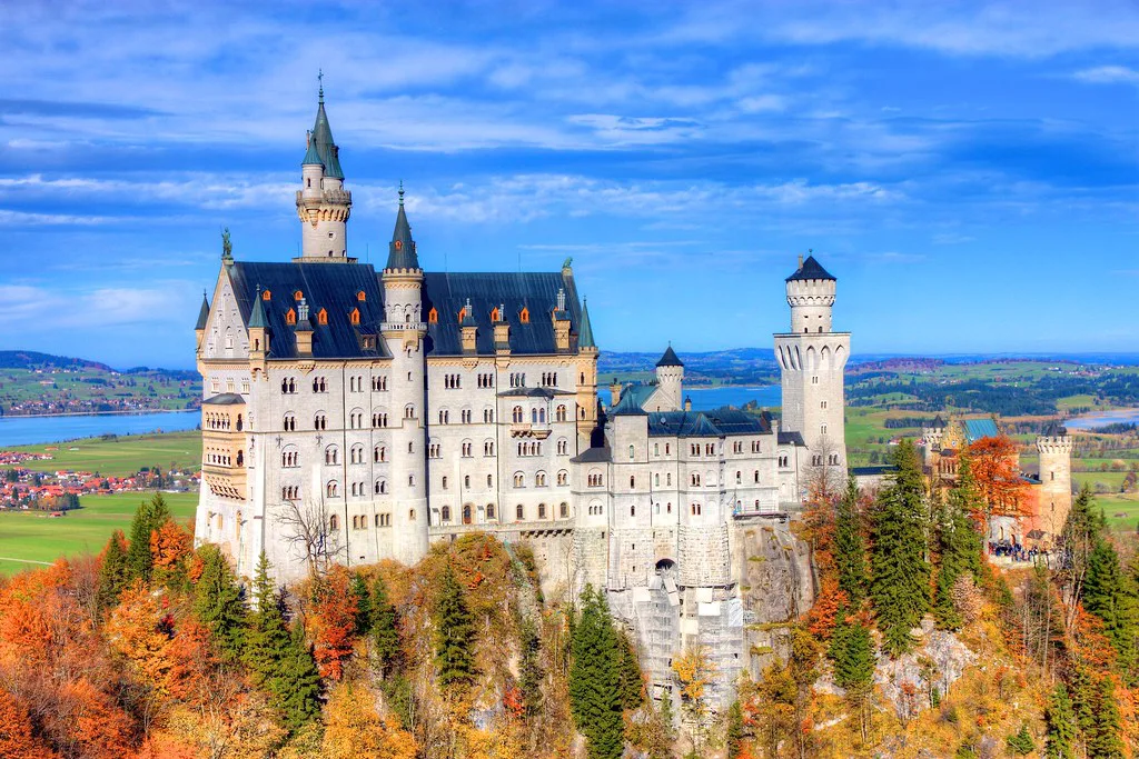 Neuschwanstein Castle in autumn near Füssen, seen from Marienbrücke.