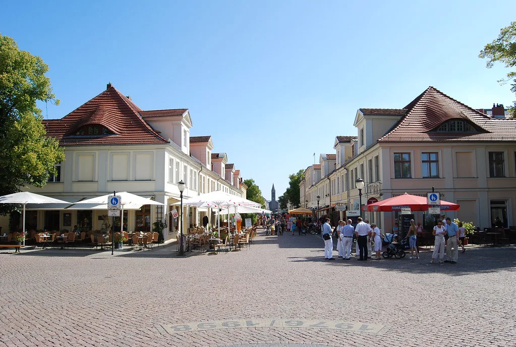Café umbrellas on a street in the city center, Potsdam.