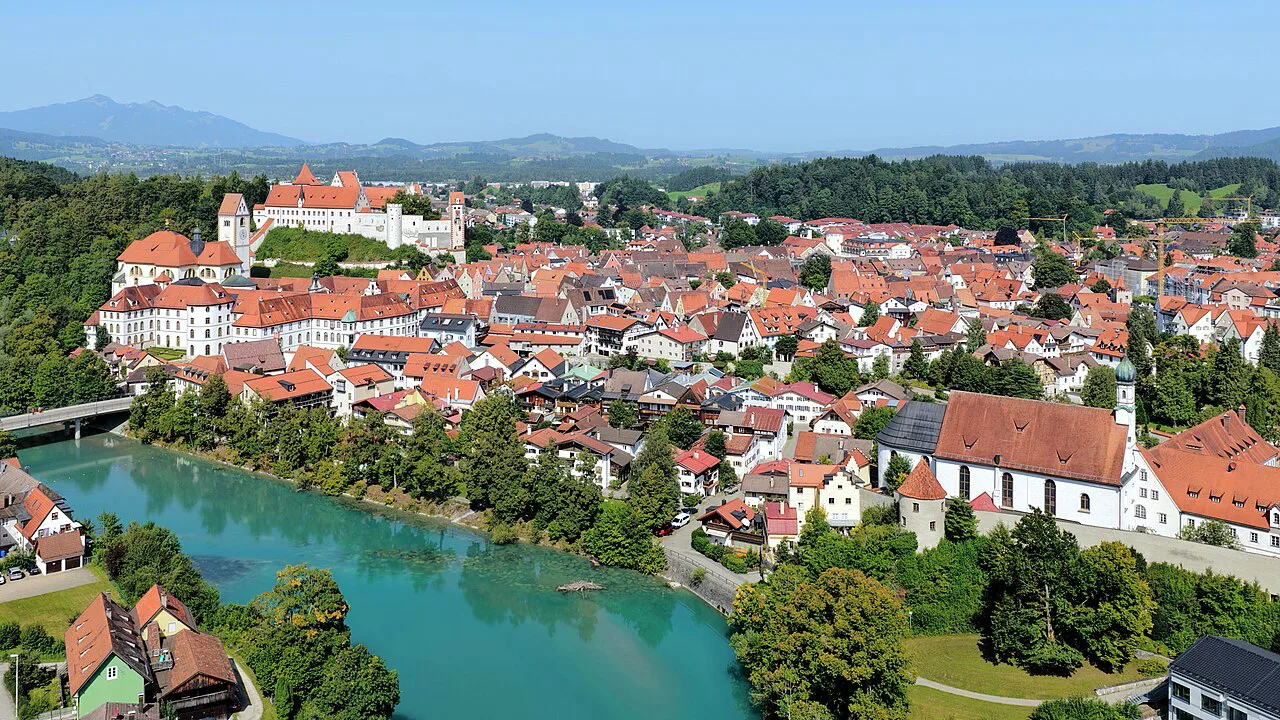 Füssen's old town above the turquoise Lech River.