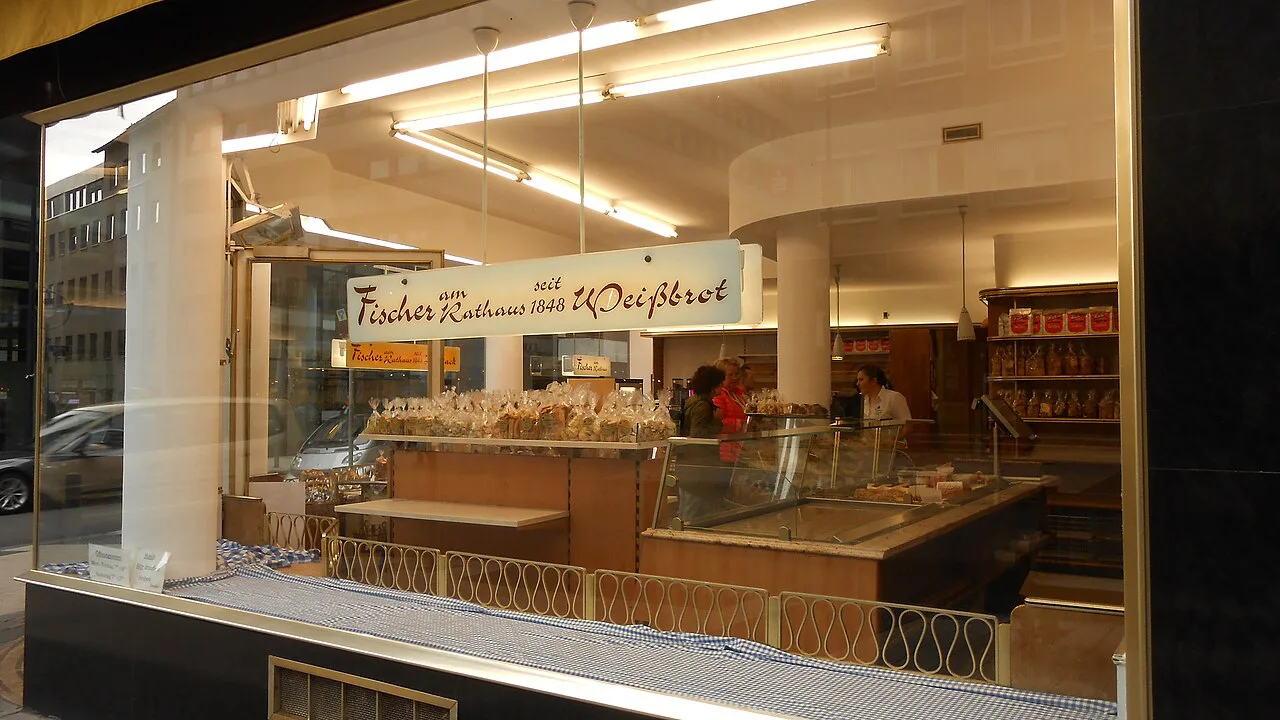 Cakes and pastries in the Fischer am Rathaus bakery window, Dortmund.