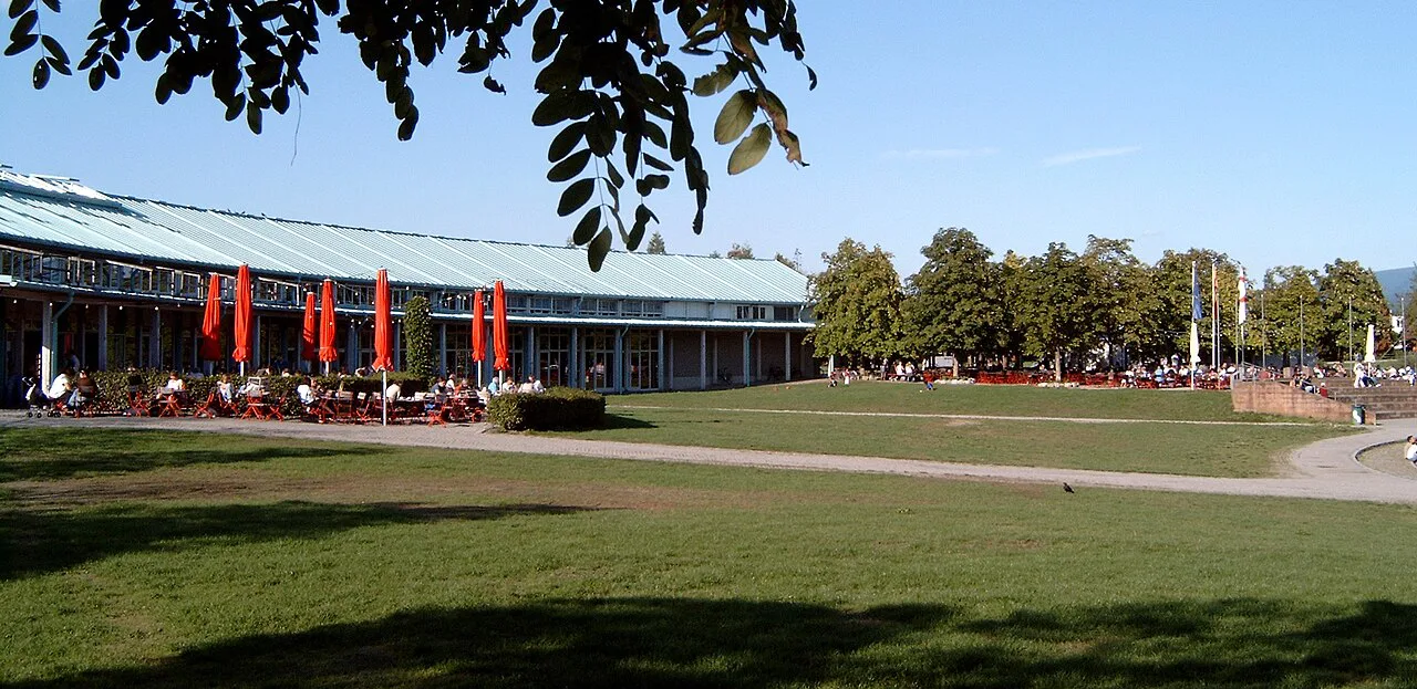 Beer garden tables at the Bürgerhaus in Freiburg's Seepark.