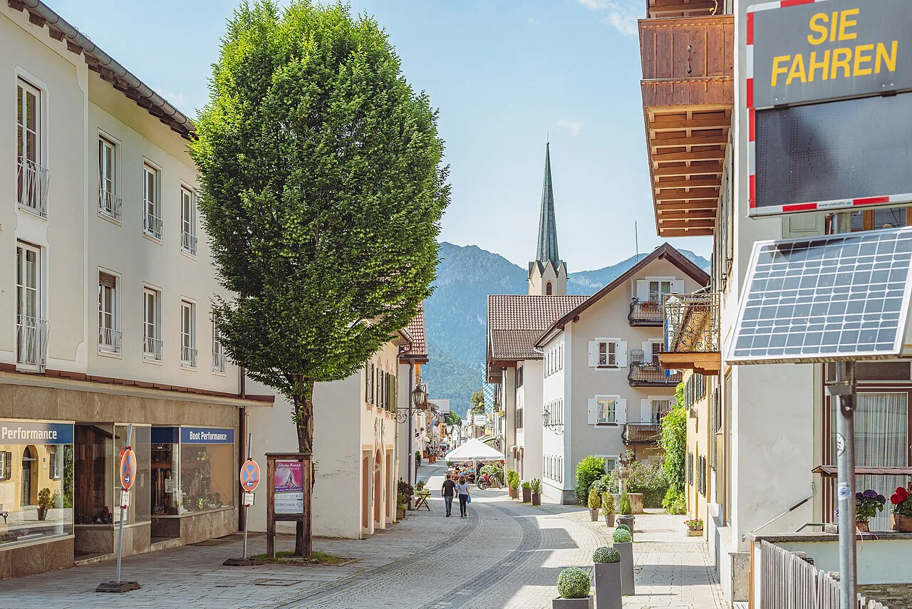 Ludwigstraße with its painted houses and church tower, Garmisch-Partenkirchen.