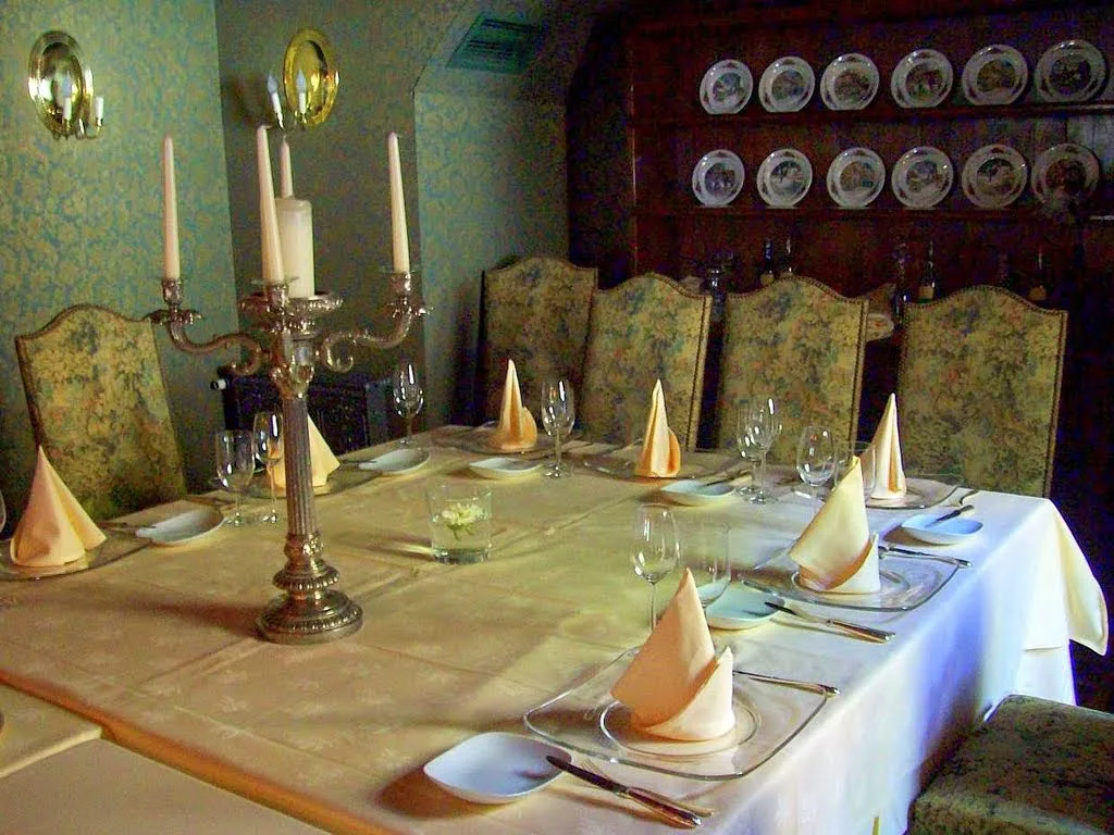A table set in the historic restaurant of the Hirschgasse inn, Heidelberg.