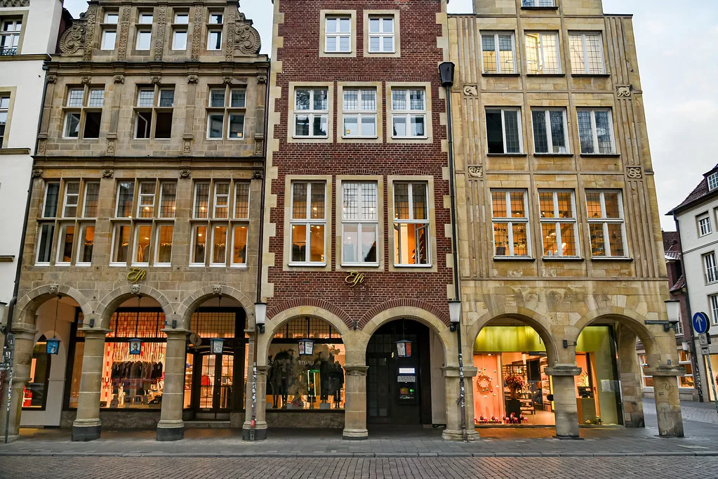 Gabled houses with ground-floor arcades in Münster's old town.