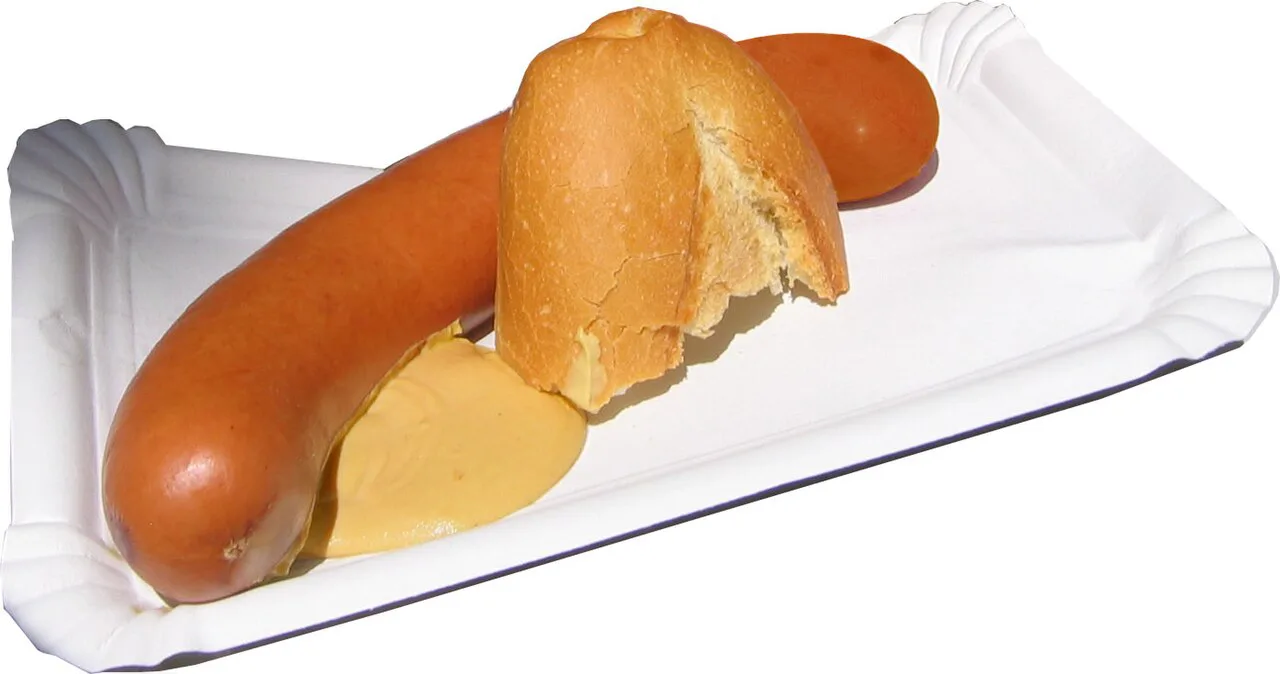 Bockwurst with a bread roll and mustard.