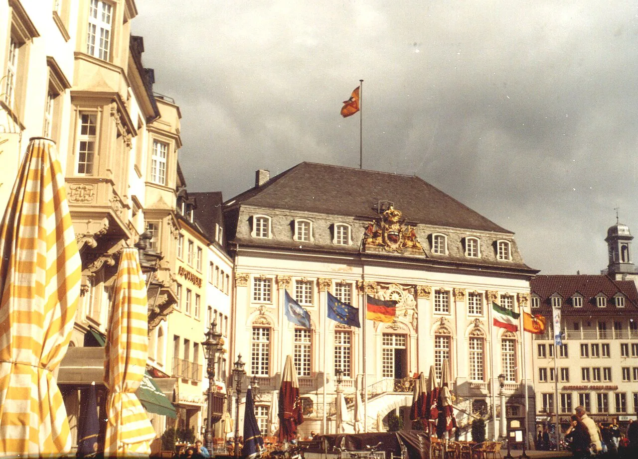 Café umbrellas in front of the Old Town Hall on the Market Square, Bonn.
