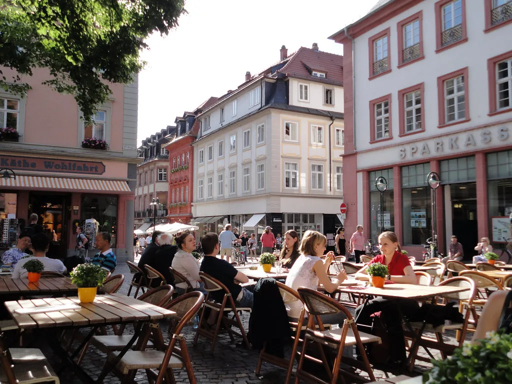 Street café tables in Heidelberg's old town.