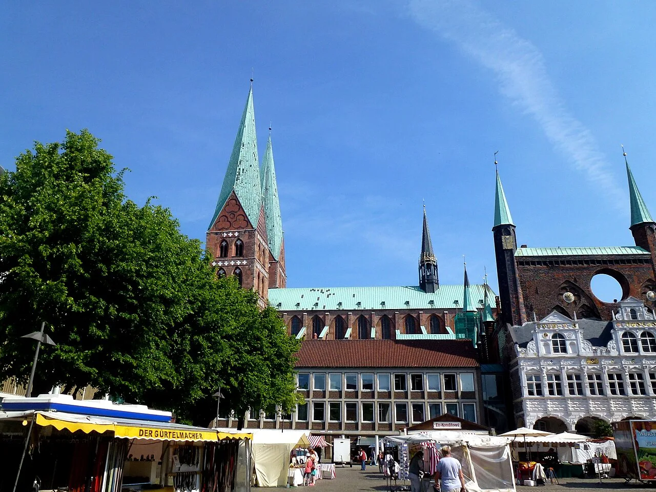 Market stalls on Lübeck's Marktplatz below St. Mary's Church.
