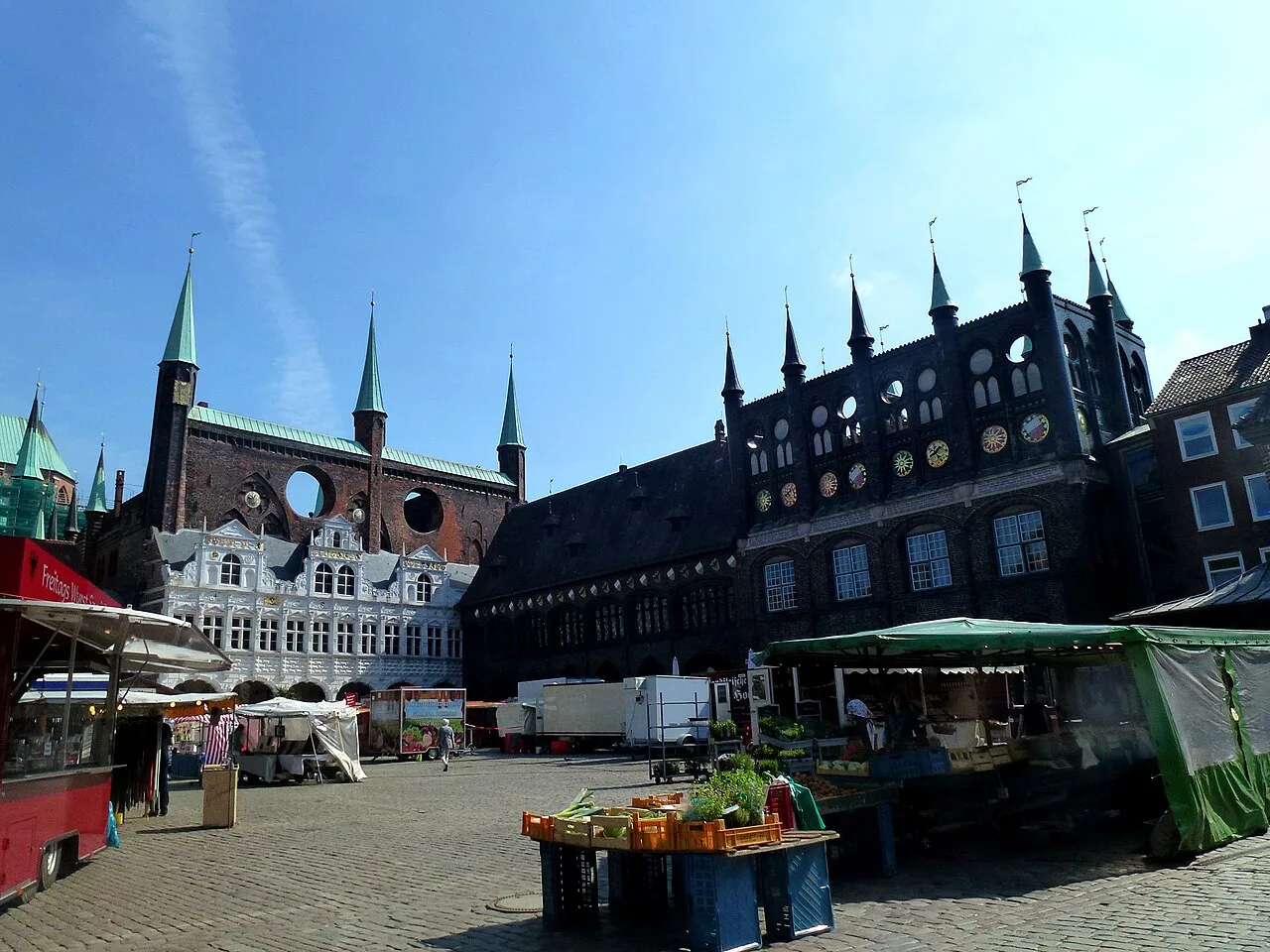 Market stalls in front of the town hall on Lübeck's Marktplatz.