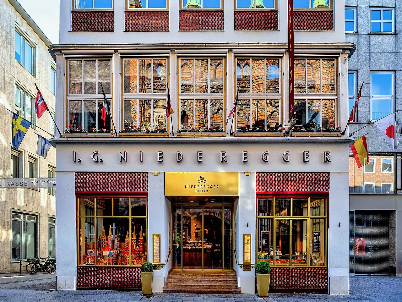Café Niederegger in its red and gold building on Breite Straße, Lübeck.
