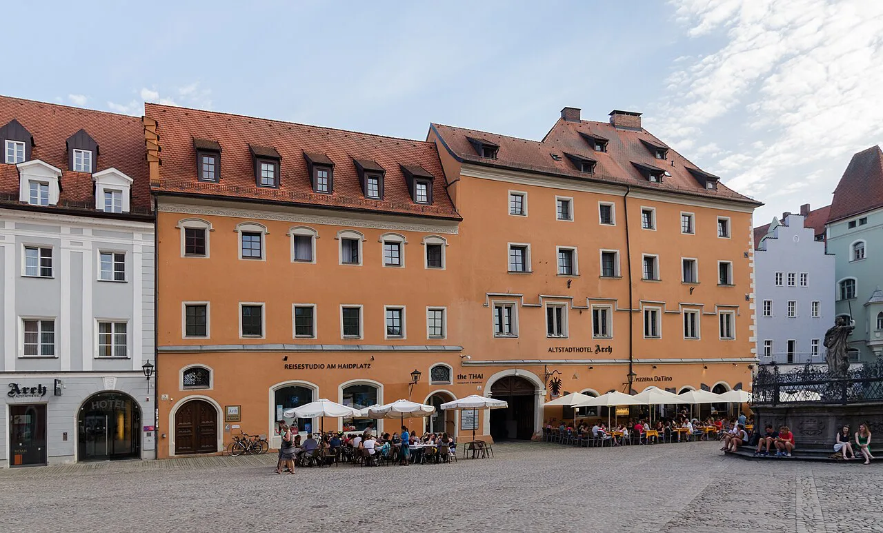 Terrace dining in front of the former House Zur Arch on Haidplatz, Regensburg.