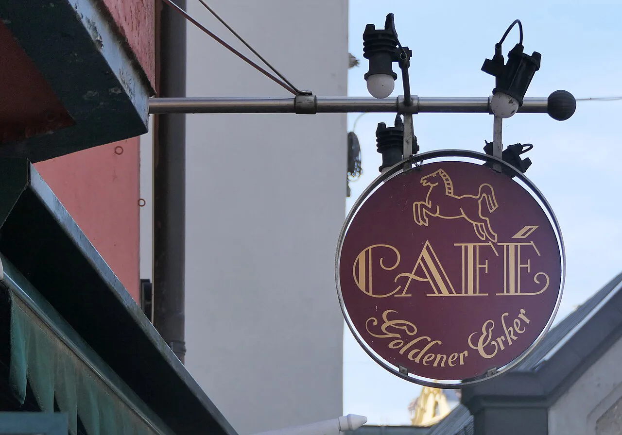The hanging sign of Café Goldener Erker, Augsburg.