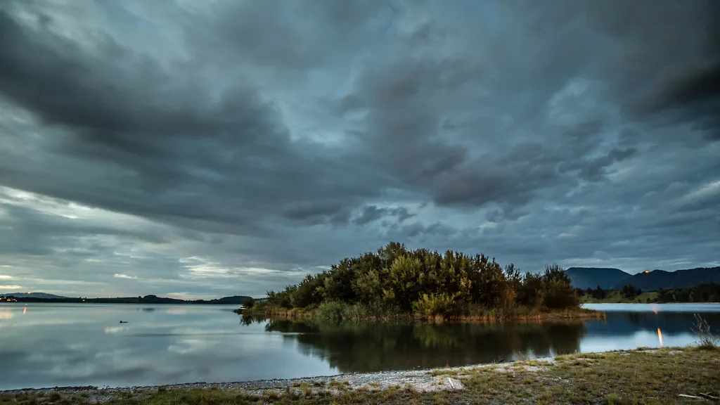 Storm clouds over the Forggensee lake north of Füssen.