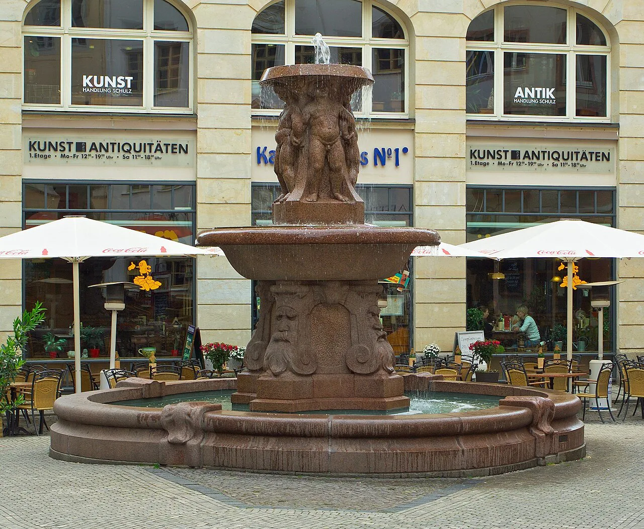 The Lipsia Fountain with café tables, Leipzig.
