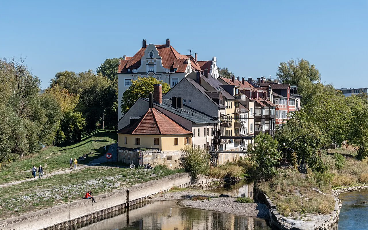 The old town and Stadtamhof by the historic lock on the Danube islands, Regensburg.