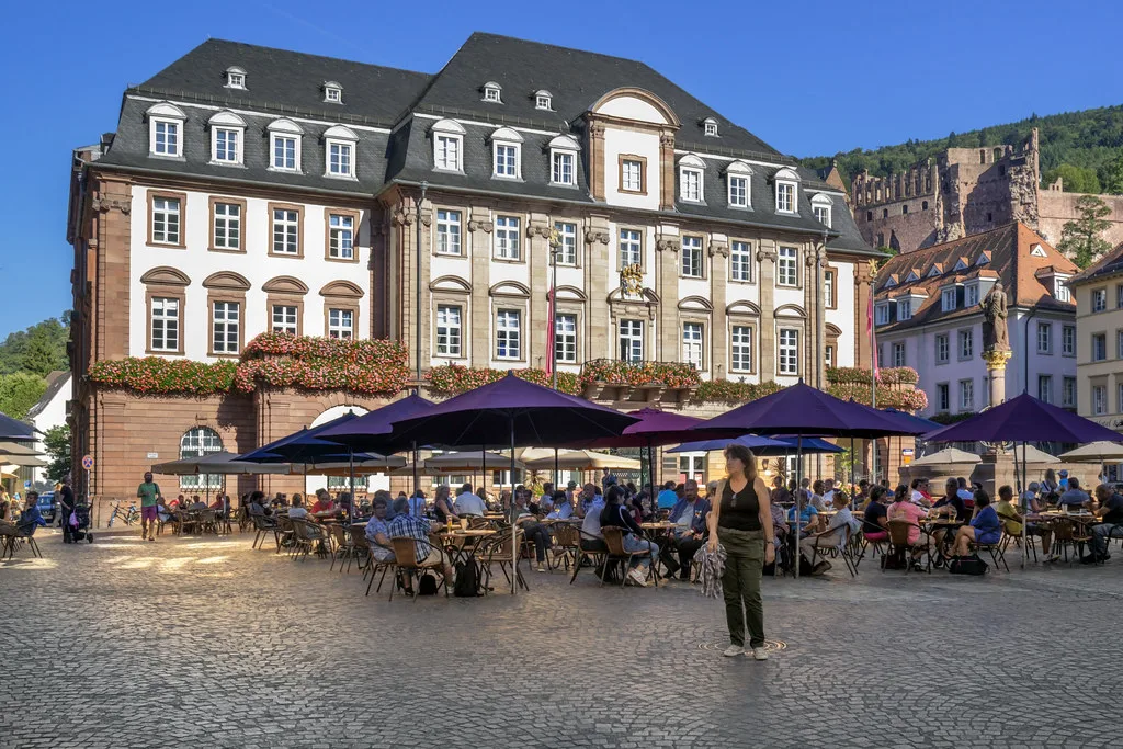Café tables on the Marktplatz in front of the Town Hall, Heidelberg.