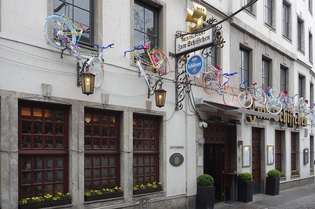 Zum Schiffchen restaurant in Düsseldorf Altstadt, decorated with bicycles for the Tour de France start.