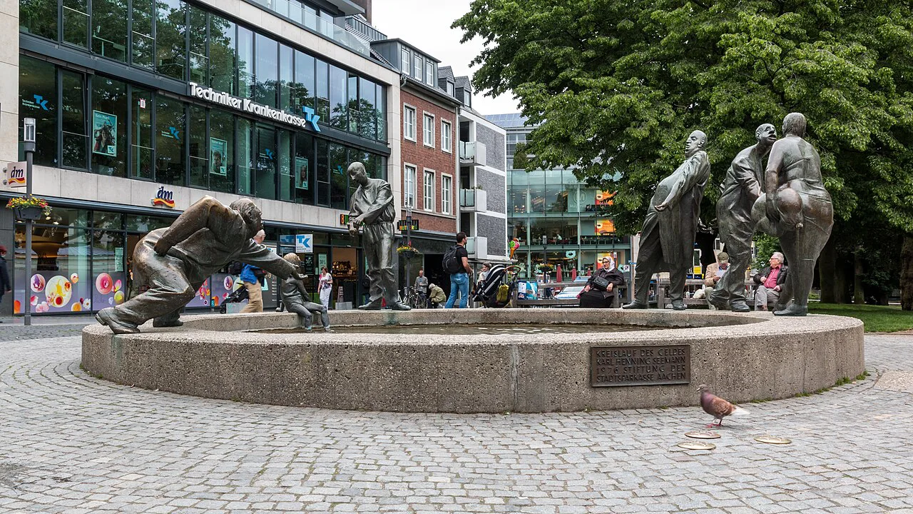 The bronze "Kreislauf des Geldes" fountain in central Aachen.
