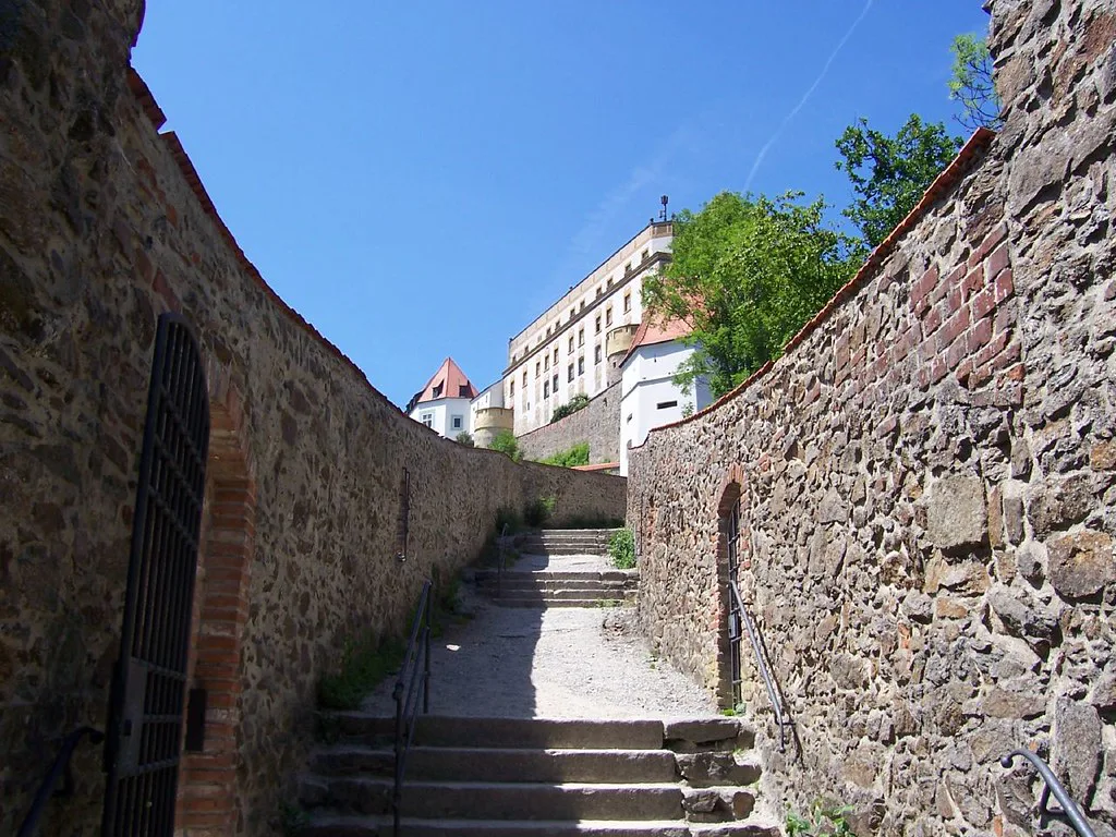 Stone steps between fortress walls leading up to Veste Oberhaus, Passau.