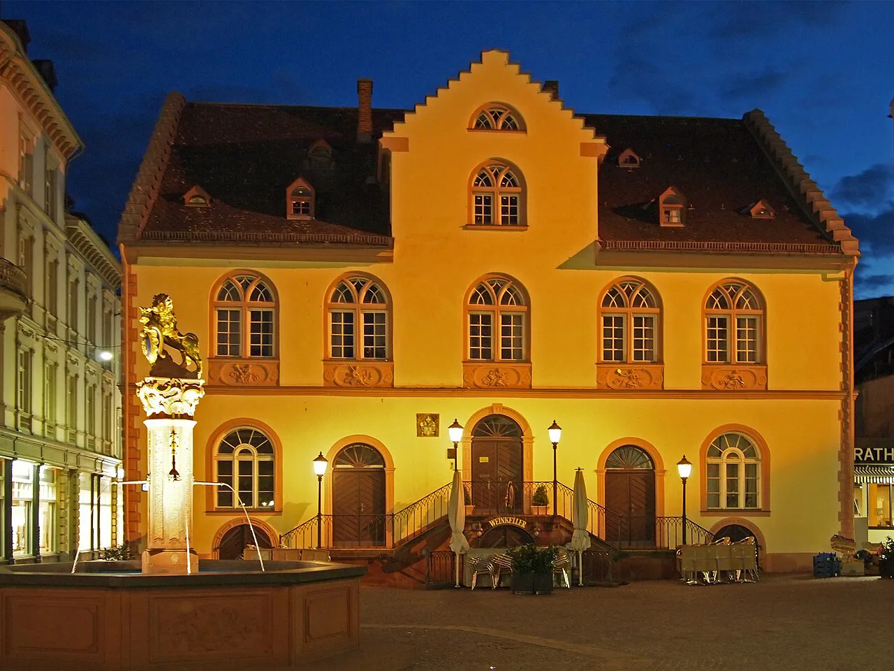 The Old Town Hall on Schlossplatz lit up at night, Wiesbaden.