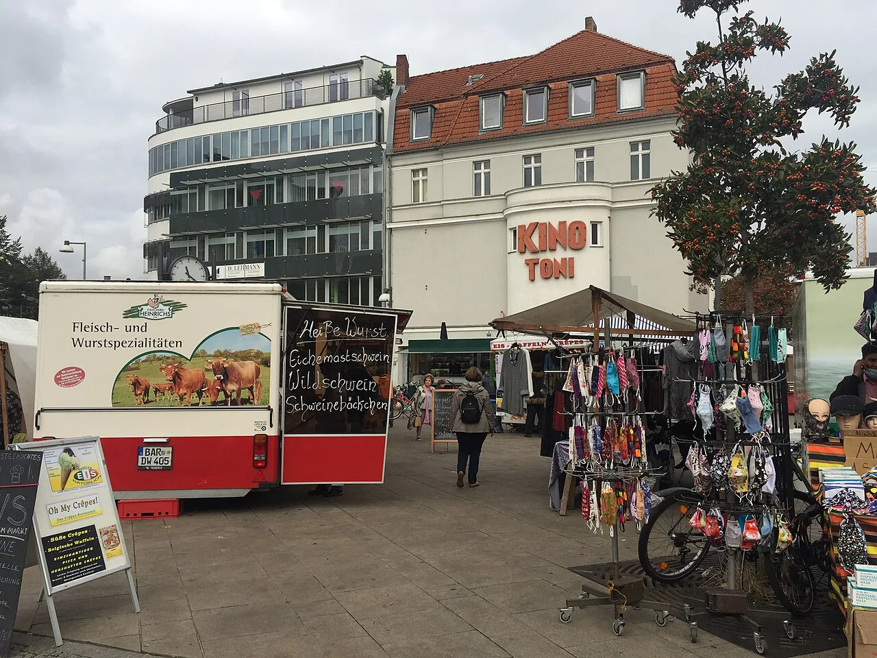 Market vans and stalls at the weekly market on Antonplatz, Berlin-Weissensee.