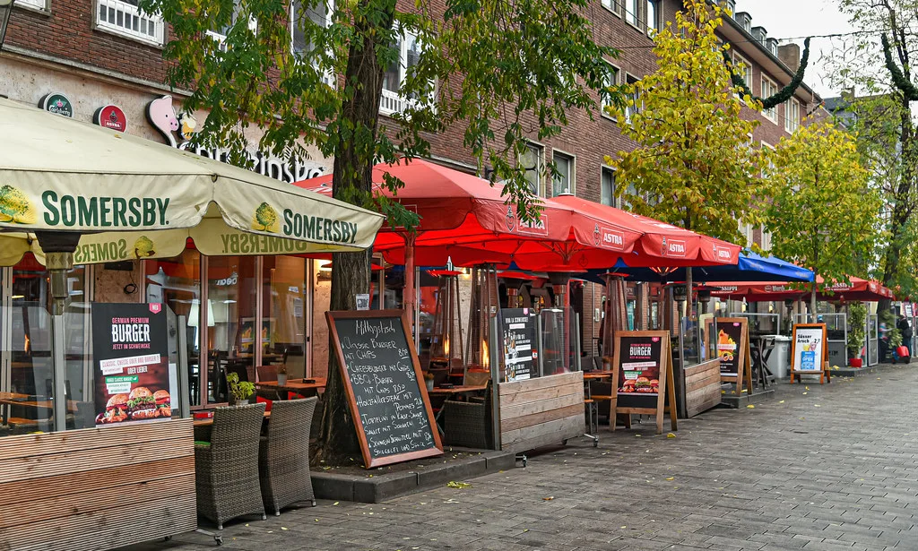 Café and bar terraces on a street in the old town, Düsseldorf.