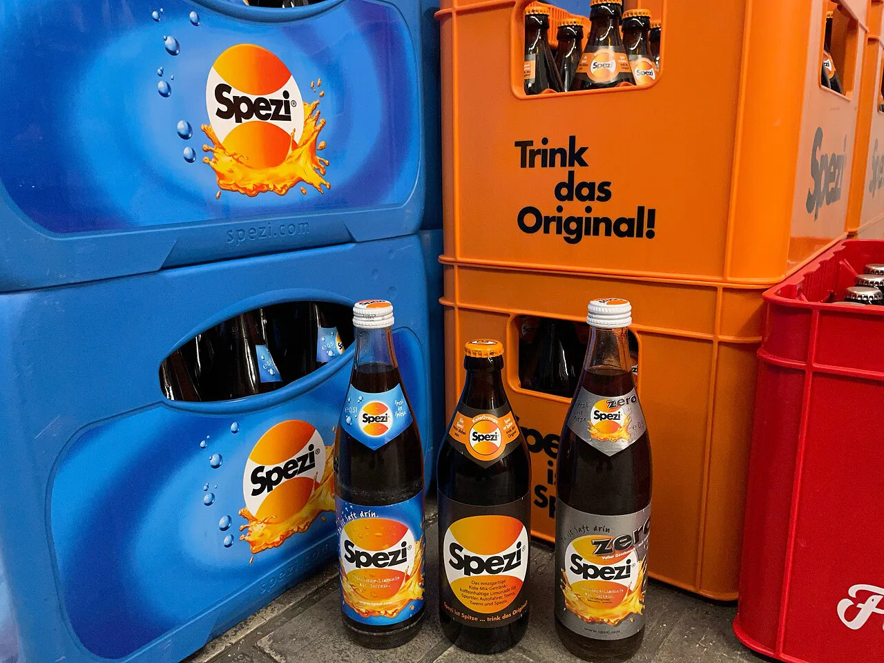 Bottles and crates of Spezi, the German cola and orange soft drink.