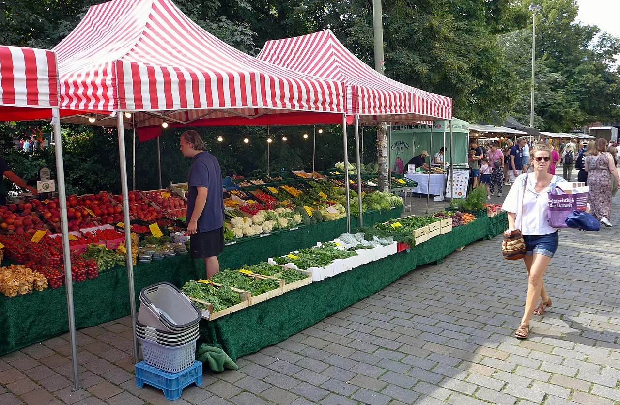 Produce stands at the weekly market on Hackescher Markt, Berlin.