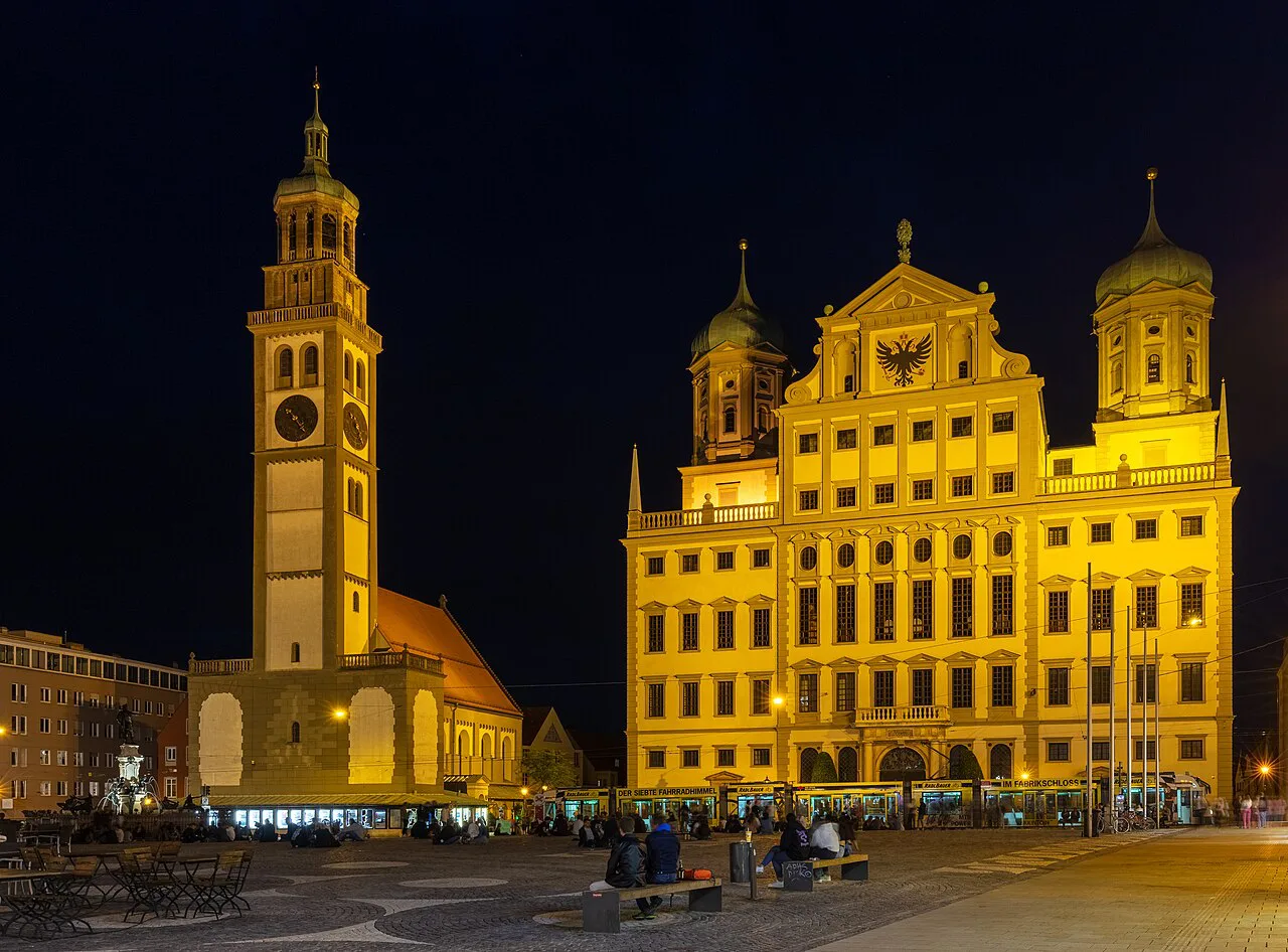 Augsburg Town Hall and the Perlach Tower lit up at night on Rathausplatz, Augsburg.