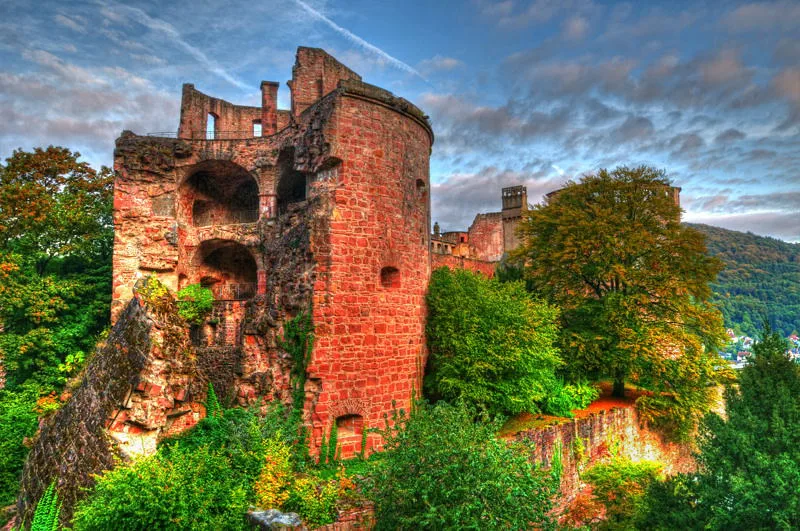A ruined red sandstone tower of Heidelberg Castle.