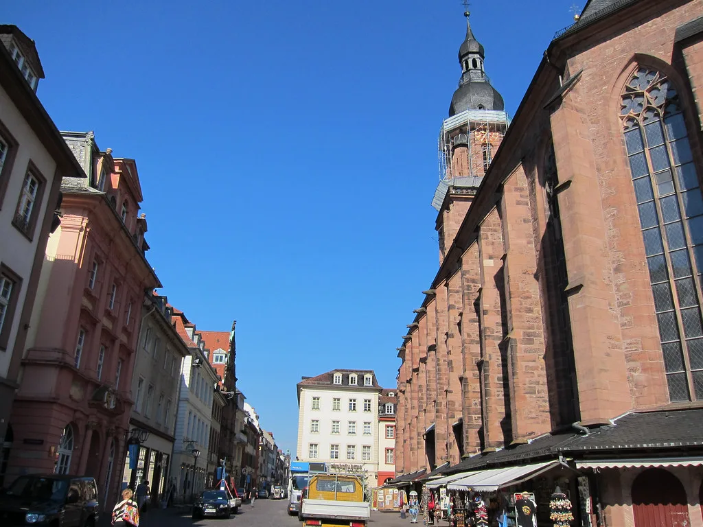 Hauptstrasse beside the Church of the Holy Spirit in Heidelberg's old town.