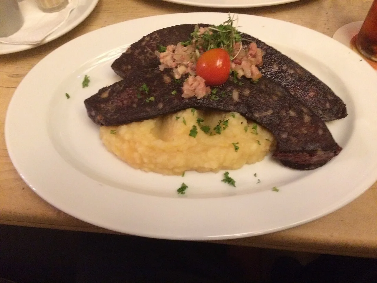Rhineland-style Himmel und Erde with blood sausage and bacon onions.