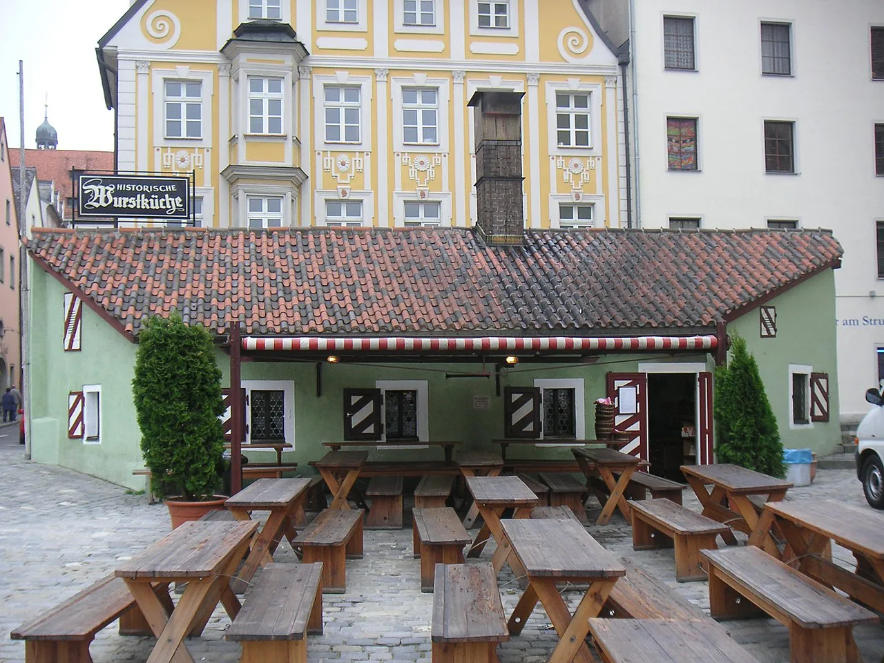 The Historische Wurstkuchl and its outdoor benches, Regensburg.