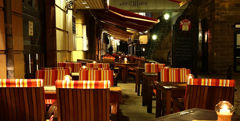Café seating on an evening in Dresden.