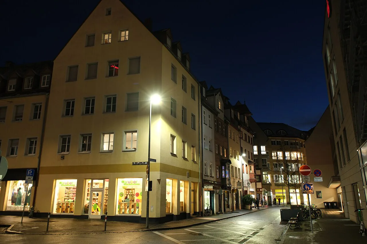 Theatergasse in Nuremberg's old town at night.