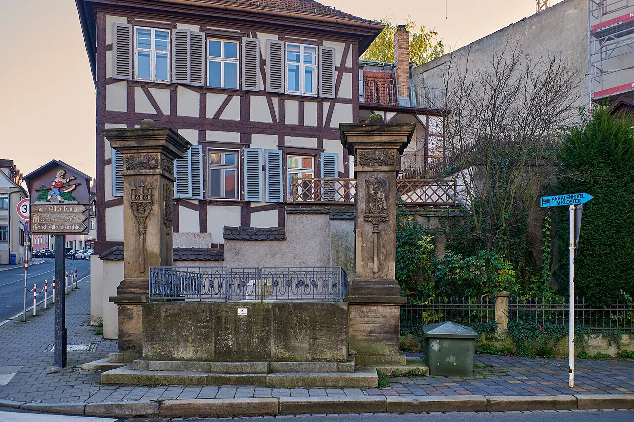 Fountain on Karmelitenplatz with half-timbered houses, Bamberg.