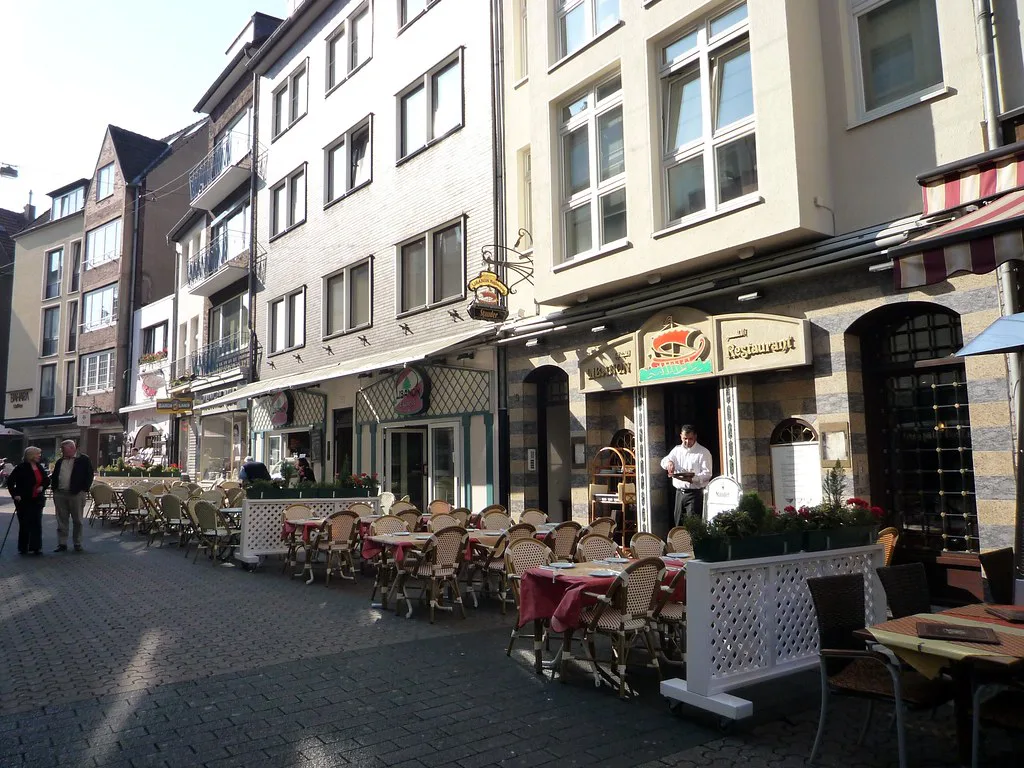 Café terraces on a street in the old town, Düsseldorf.