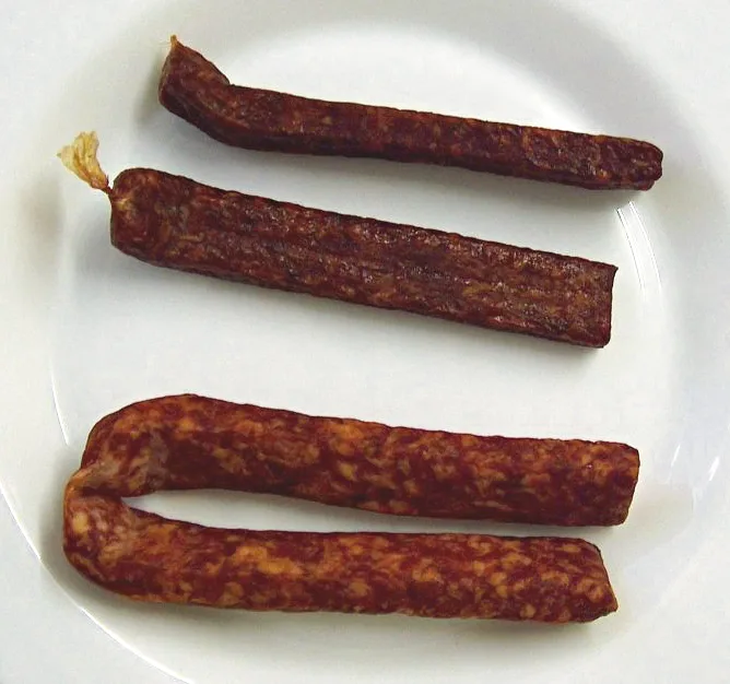 Pairs of Landjäger sausages on a plate.