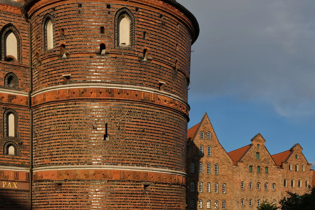 A tower of the Holstentor gate beside the old salt storehouses, Lübeck.