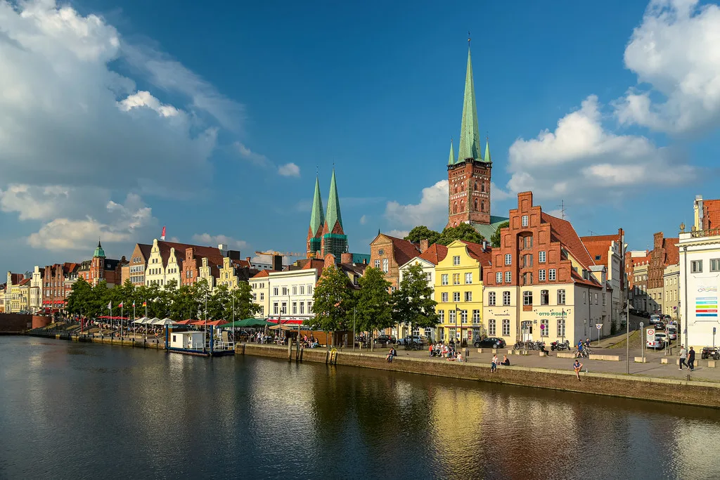 The old town skyline across the Trave river, Lübeck.