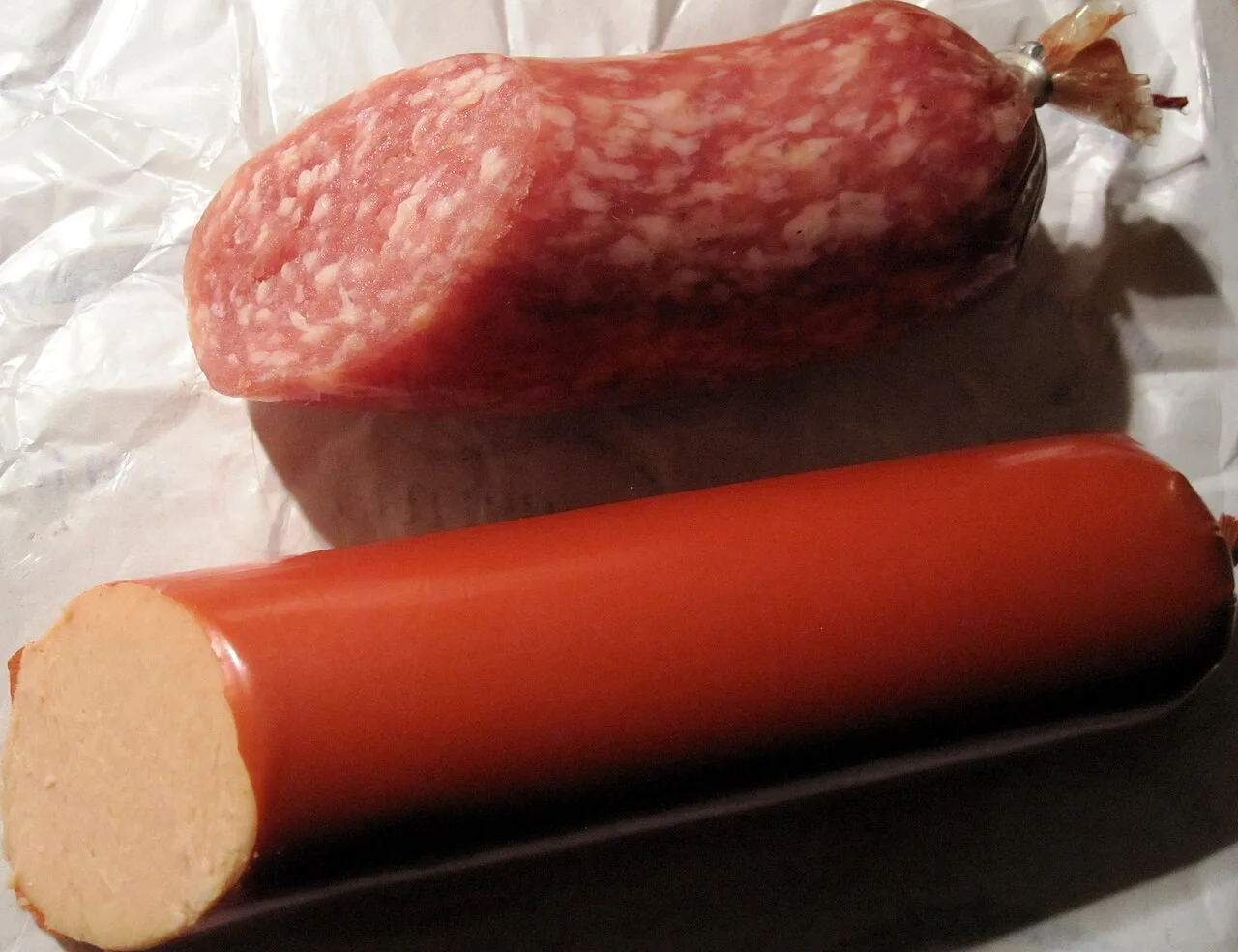 Braunschweiger Mettwurst, whole and cut.