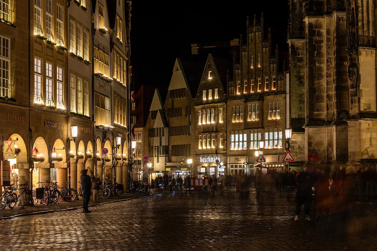 Prinzipalmarkt arcades with Christmas lights at night, Münster.