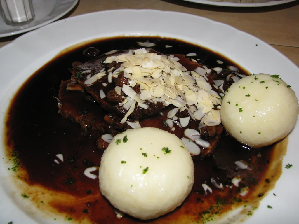 Rheinischer Sauerbraten with potato dumplings at Brauhaus Sion, Cologne.