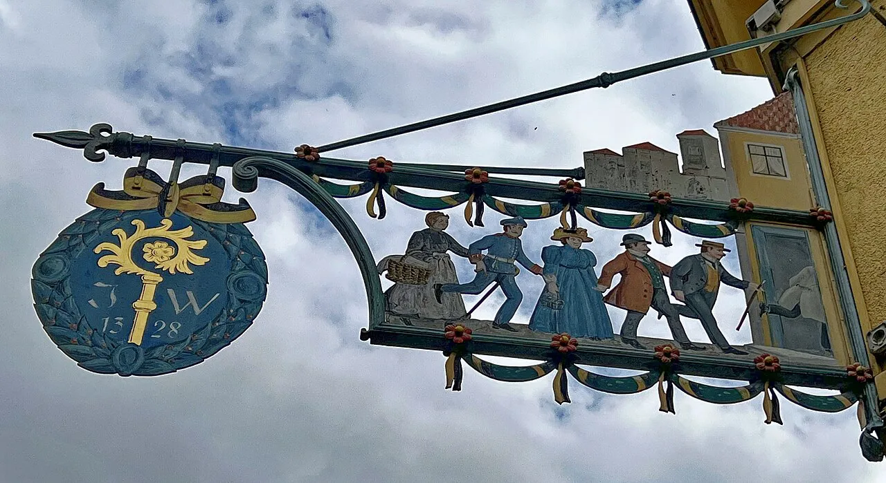 Wrought-iron sign of the Gasthaus Isarthor, Munich.
